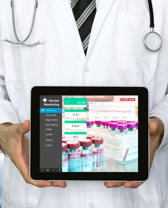 Doctor holding digital tablet showing data